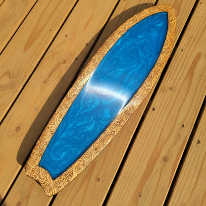 Surfboard diagonal flat-lay sunny deck blue resin
